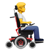 person i permobil: åt höger